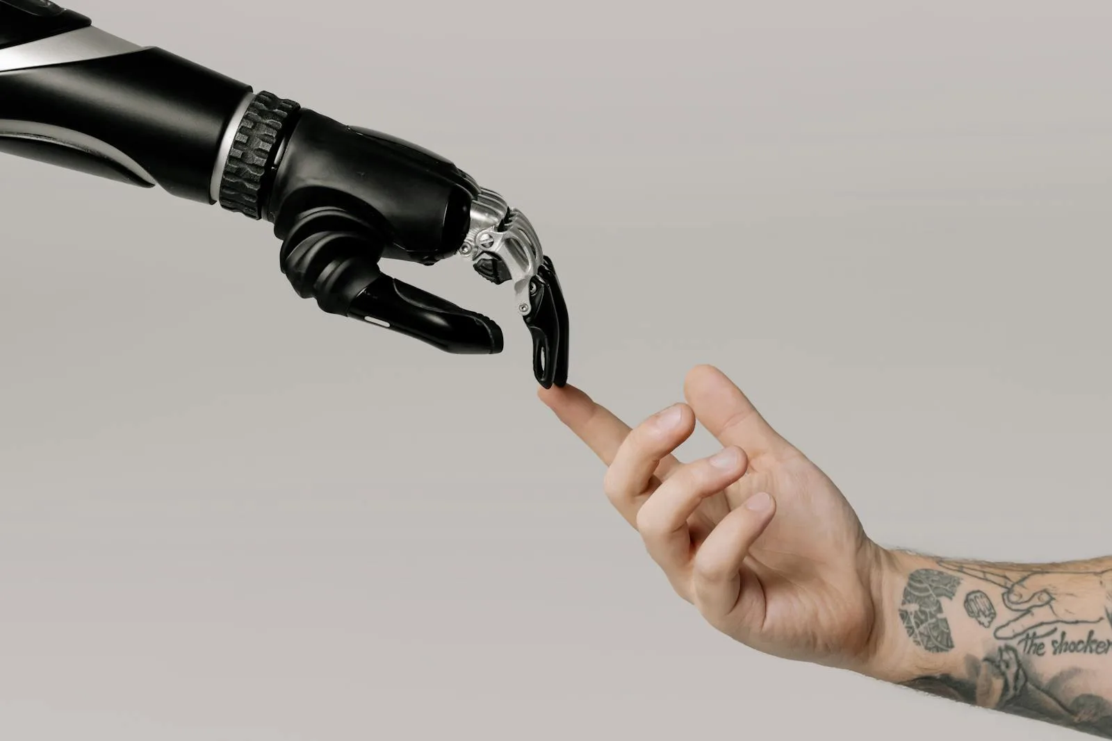 Artificial Intelligence is propelling tech giants, Microsoft & Google, to sparkling heights Bionic Hand and Human Hand Finger Pointing